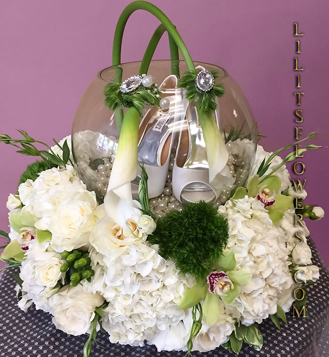 Armenian style wedding shoes gift box - Just as the name suggest; 
                                                    this arrangement has every beautiful flower in the garden imaginable. Armenian floral arrangement. 
                                                        Make sure to share with us your arrangement.
                                                        https://goo.gl/maps/Jgj1JeCetJv - Armenian Special arrangement wedding shoes gift box - Glendale Florist