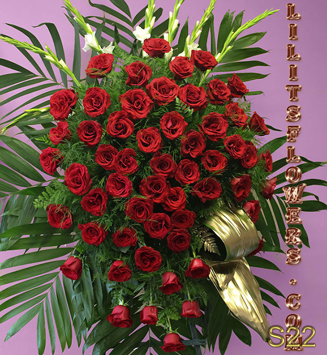 beautiful sympathy arrangement for Forest Lawn Burbank, ca red roses spray