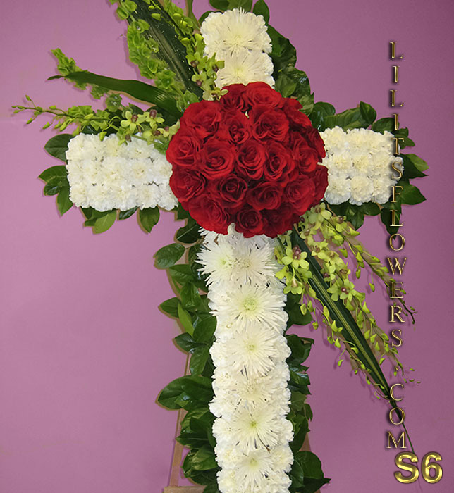 sympathy cross with white carnations and red roses