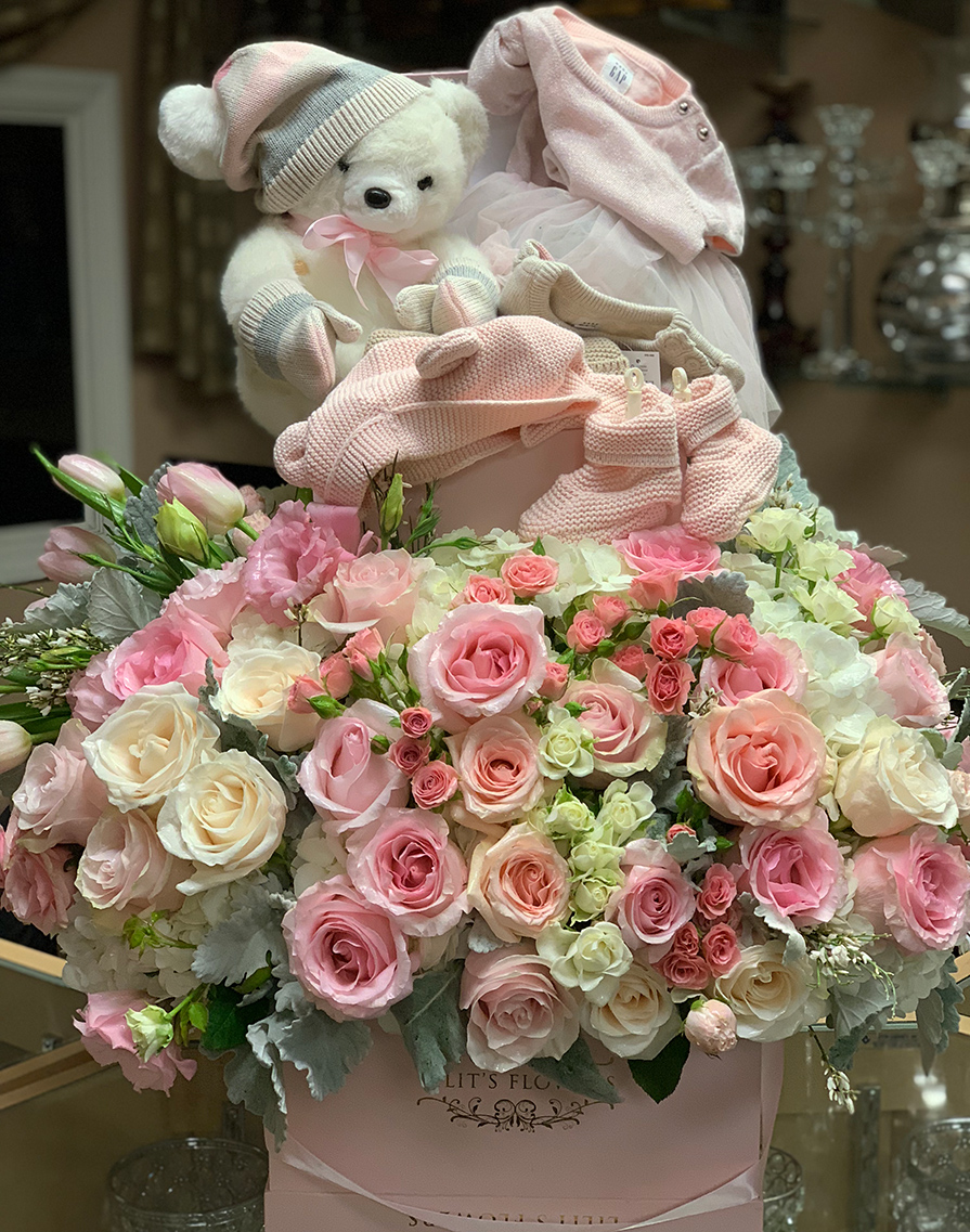 elegant bouquet in the white pink box, pink veronicas, pink spray roses