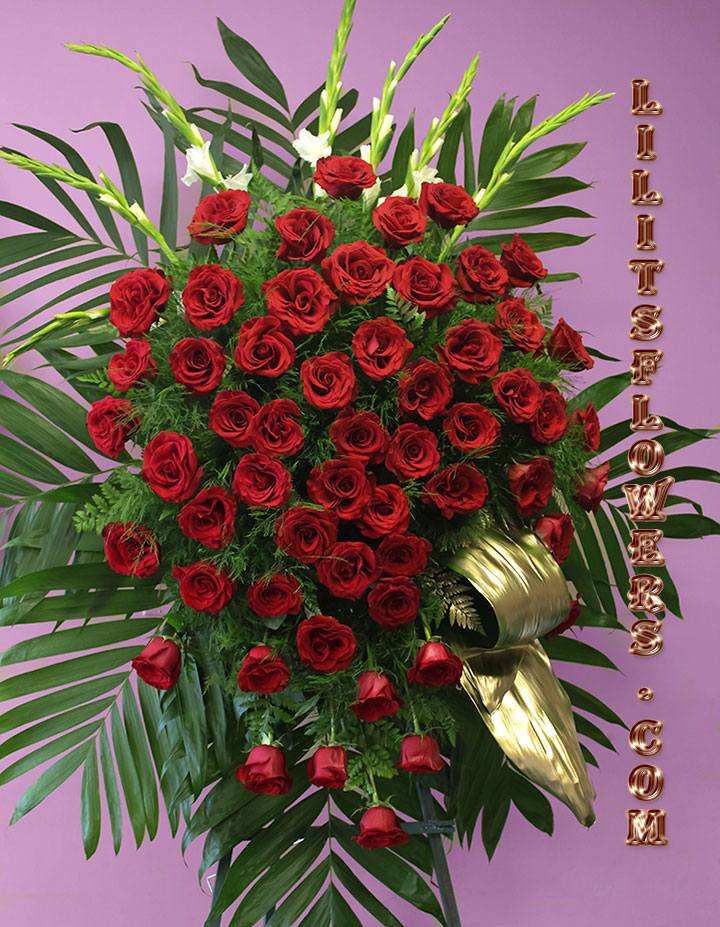 elegant spray with red roses