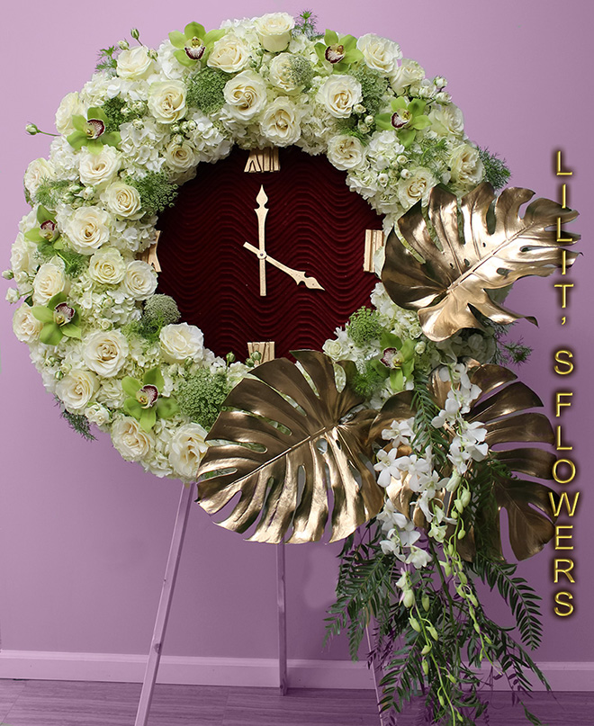 Funeral Florist in Los Angeles, CA Flower Delivery - beautiful sympanthy clock  - beautiful sympathy clock composed of white roses and white and green orchids-
Lilit's Flowers is the premier sympathy flower shop for Los Angeles, CA and the surrounding towns. Order flowers online from Glendale Florist for same day local flower delivery from conveniently located shops in Southern California to send flowers to Glendale, Los Angeles,  Hollywood, Echo Park, Silver Lake, Atwater Village, Burbank, Sherman Oaks, La Cañada, Flintridge, Pasadena, San Marino, Alhambra, Arcadia, Thousand Oaks, Tarzana, Tujunga, La Crescenta,Toluca Lake and more.

Make sure to share with us your arrangement.
 https://goo.gl/maps/Jgj1JeCetJv - white spray - sympathy flowers Los Angeles, CA